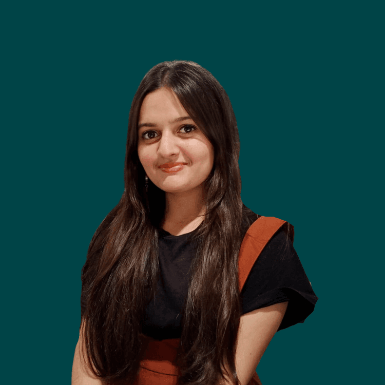 Pooja Belbase sitting with a smile